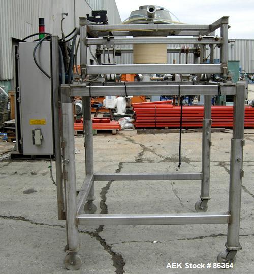Used Supersack Unloader Consisting Of: (1) Stainless steel frame with a 12" diameter cuff, mounted on casters. MT Weigh Systems scales, model 8000HE-1K, 1000 pound capacity; (2) 304 stainless steel p...