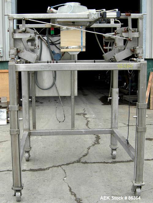 Used Supersack Unloader Consisting Of: (1) Stainless steel frame with a 12" diameter cuff, mounted on casters. MT Weigh Systems scales, model 8000HE-1K, 1000 pound capacity; (2) 304 stainless steel p...