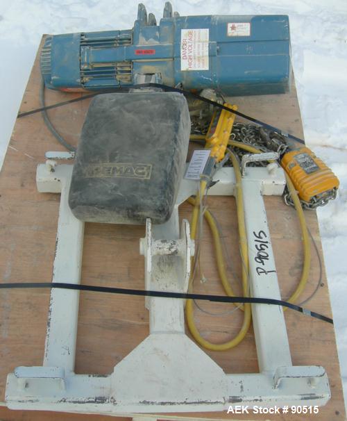 Used: Taylor Products bulk bag discharger, model DW-1000, approximate 2000 pound capacity. Includes a 54" diameter vibrating pan with bag holder, vibrating motor, and a Demag hoist with bag holder. F...