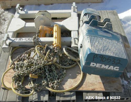 Used: Taylor Products bulk bag discharger, model DW-1000, approximate 2000 pound capacity. Includes a 54" diameter vibrating pan ,no motor, and a Demag hoist with bag holder. Frame measures 65" wide ...