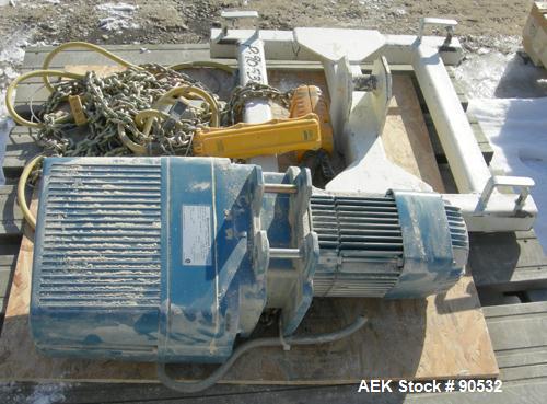 Used: Taylor Products bulk bag discharger, model DW-1000, approximate 2000 pound capacity. Includes a 54" diameter vibrating pan ,no motor, and a Demag hoist with bag holder. Frame measures 65" wide ...