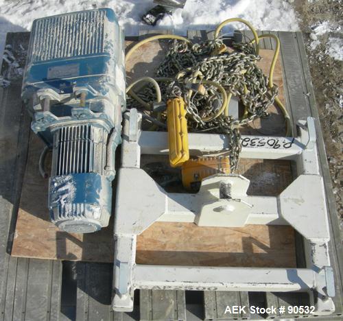 Used: Taylor Products bulk bag discharger, model DW-1000, approximate 2000 pound capacity. Includes a 54" diameter vibrating pan ,no motor, and a Demag hoist with bag holder. Frame measures 65" wide ...