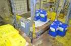 Used Blending Enzyme System including Top Mounted Super Sack Bag Unloading System with Hanger, Vacuum, Dust Filter, Blower, Wall Mounted Carbon Steel Electrical Enclosure Panel with Mettler Toledo Pa...
