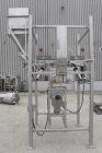 Used Super Sack Unloader, 304 Stainless Steel. (1) Frame with top height adjustment, 1 bag holder I beam ( no hoist), (2) bag valves. Includes (3) Flexicon screw conveyor drive ends (no tubes or scre...