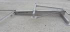 Used Super Sack Unloader, 304 Stainless Steel. (1) Frame with top height adjustment, 1 bag holder I beam ( no hoist), (2) bag valves. Includes (3) Flexicon screw conveyor drive ends (no tubes or scre...