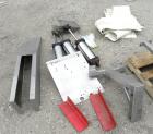 Used Super Sack Unloader, 304 Stainless Steel. (1) Frame with top height adjustment, 1 bag holder I beam ( no hoist), (2) bag valves. Includes (3) Flexicon screw conveyor drive ends (no tubes or scre...