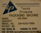 Used: Taylor Products bulk bag discharger, model DW-1000, approximate 2000 pound capacity. Includes a 54