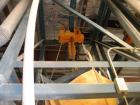 Used Vibra Screw Bulk Bag Supersack Unloader. Includes overhead traveling hoist for bags rated for 4,000 pounds maximum capacity. Heavy duty frame, bag support hopper, vibration discharge system, mil...