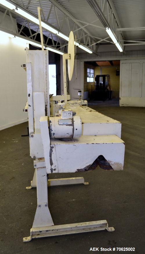 Used Doboy Model PT Pinch Bottom Bag Sealer. Up to 30 bags per minute. Designed for multiwall bags with heat-sealable inner liners. Sews bags, trims tops, applies pre-coated heat-sealable tape, and i...