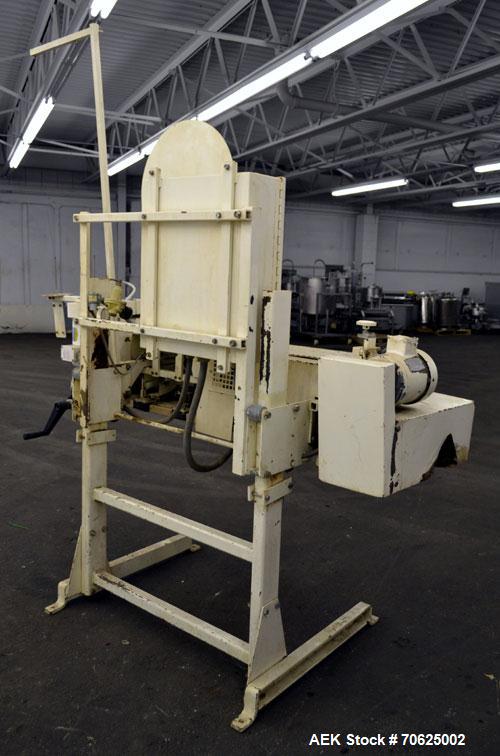 Used Doboy Model PT Pinch Bottom Bag Sealer. Up to 30 bags per minute. Designed for multiwall bags with heat-sealable inner liners. Sews bags, trims tops, applies pre-coated heat-sealable tape, and i...