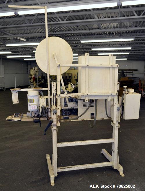 Used Doboy Model PT Pinch Bottom Bag Sealer. Up to 30 bags per minute. Designed for multiwall bags with heat-sealable inner liners. Sews bags, trims tops, applies pre-coated heat-sealable tape, and i...