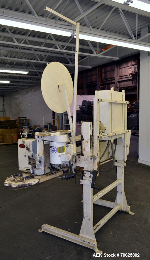 Used Doboy Model PT Pinch Bottom Bag Sealer. Up to 30 bags per minute. Designed for multiwall bags with heat-sealable inner liners. Sews bags, trims tops, applies pre-coated heat-sealable tape, and i...