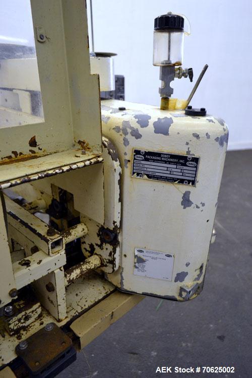 Used Doboy Model PT Pinch Bottom Bag Sealer. Up to 30 bags per minute. Designed for multiwall bags with heat-sealable inner liners. Sews bags, trims tops, applies pre-coated heat-sealable tape, and i...