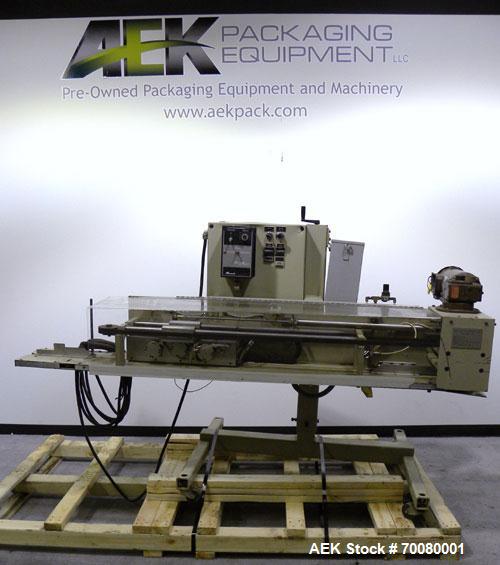 Used Fres-Co Systems Band Sealer, Model FSU-103. Capable of sealing up to 16 Bags per minute. Handles bags from 5 to 100 lbs. Bag clearance height from 24"up to 54" Approximately 21" long traveling s...