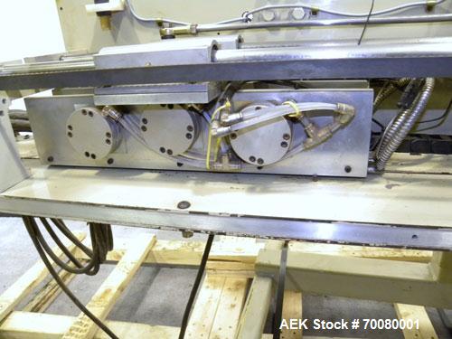 Used Fres-Co Systems Band Sealer, Model FSU-103. Capable of sealing up to 16 Bags per minute. Handles bags from 5 to 100 lbs. Bag clearance height from 24"up to 54" Approximately 21" long traveling s...