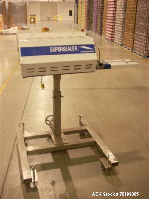 Used OK International SSI Hot Air Continuous Motion Bag Sealer capable of speeds up to 75 feet per minute. 1/60/110V, 15 amp, plain and knurl sealing wheels, adjustable height steel stand with crank,...