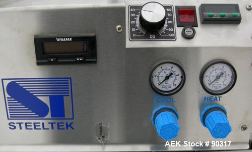 USED: Steeltek rotary heat sealing machine, model ST-200 Medical. Approximate 24" long seal range. Manually adjustable height. Driven by a 1/12 hp, 130 volt, DC motor with speed controller, approxima...