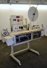 Used Doboy Model PT Pinch Bottom Bag Sealer. Up to 30 bags per minute. Designed for multiwall bags with heat-sealable inner liners. Sews bags, trims tops, applies pre-coated heat-sealable tape, and i...