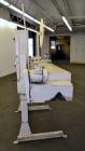 Used Doboy Model PT Pinch Bottom Bag Sealer. Up to 30 bags per minute. Designed for multiwall bags with heat-sealable inner liners. Sews bags, trims tops, applies pre-coated heat-sealable tape, and i...