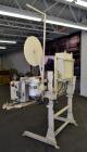 Used Doboy Model PT Pinch Bottom Bag Sealer. Up to 30 bags per minute. Designed for multiwall bags with heat-sealable inner liners. Sews bags, trims tops, applies pre-coated heat-sealable tape, and i...