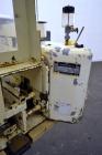 Used Doboy Model PT Pinch Bottom Bag Sealer. Up to 30 bags per minute. Designed for multiwall bags with heat-sealable inner liners. Sews bags, trims tops, applies pre-coated heat-sealable tape, and i...