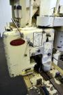 Used Doboy Model PT Pinch Bottom Bag Sealer. Up to 30 bags per minute. Designed for multiwall bags with heat-sealable inner liners. Sews bags, trims tops, applies pre-coated heat-sealable tape, and i...