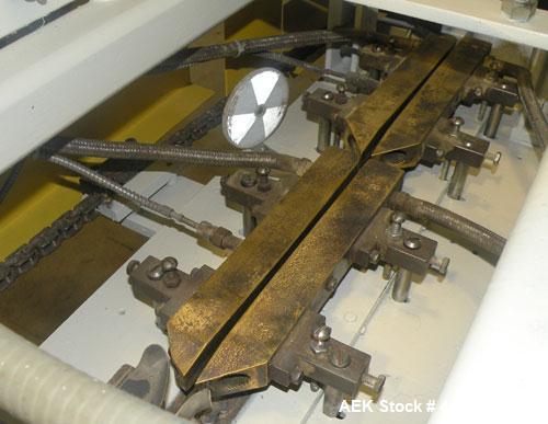 Used Doboy Hot Melt Glue Pinch Bottom Bag Sealer, Model CHG-HD. Capable of speeds up to 100 bags per minute. Machine operates right to left. Runs a double fold design with a bag size range: 3 to 20 l...