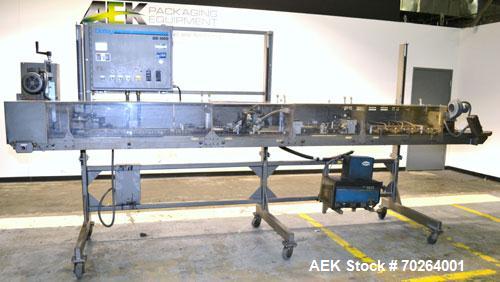 Used Doboy GS1000 double fold glue sealer capable of speeds up to 85 feet per minute. High Speed Heat Sealer for paper bags has two 3/4" folds for a strong sift proof closure. Has a Nordson Hot Melt ...