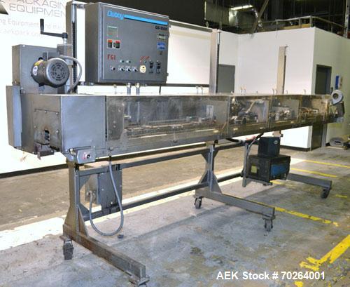 Used Doboy GS1000 double fold glue sealer capable of speeds up to 85 feet per minute. High Speed Heat Sealer for paper bags has two 3/4" folds for a strong sift proof closure. Has a Nordson Hot Melt ...