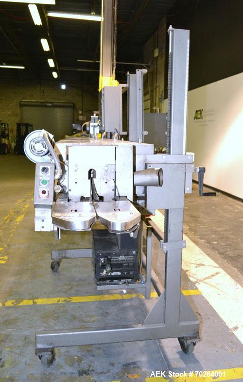 Used Doboy GS1000 double fold glue sealer capable of speeds up to 85 feet per minute. High Speed Heat Sealer for paper bags has two 3/4" folds for a strong sift proof closure. Has a Nordson Hot Melt ...
