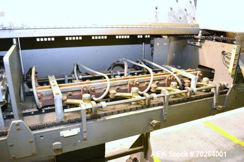 Used Doboy GS1000 double fold glue sealer capable of speeds up to 85 feet per minute. High Speed Heat Sealer for paper bags has two 3/4" folds for a strong sift proof closure. Has a Nordson Hot Melt ...