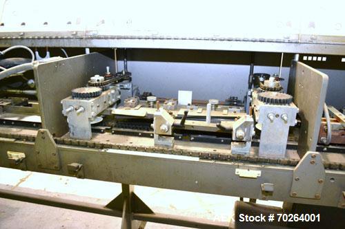 Used Doboy GS1000 double fold glue sealer capable of speeds up to 85 feet per minute. High Speed Heat Sealer for paper bags has two 3/4" folds for a strong sift proof closure. Has a Nordson Hot Melt ...