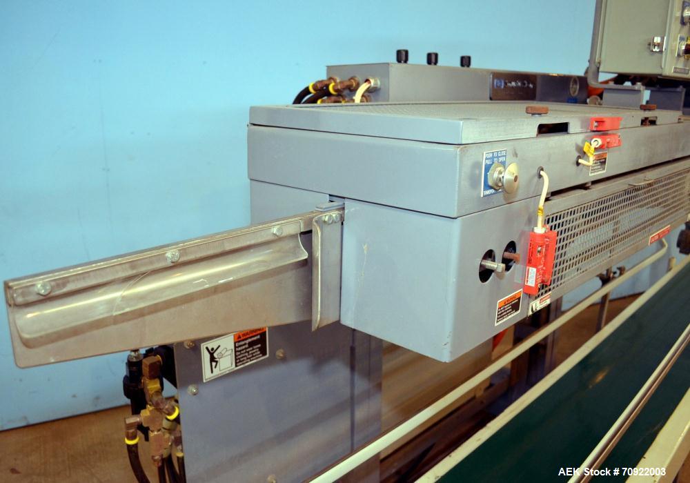 Used Altivity Packaging Model 901 Band Sealer / Closer. Designed for bags, approximate 48” long band length. With horizontal rubber belt take away conveyor in steel frame 12” x 174” long. .230 Volt, ...