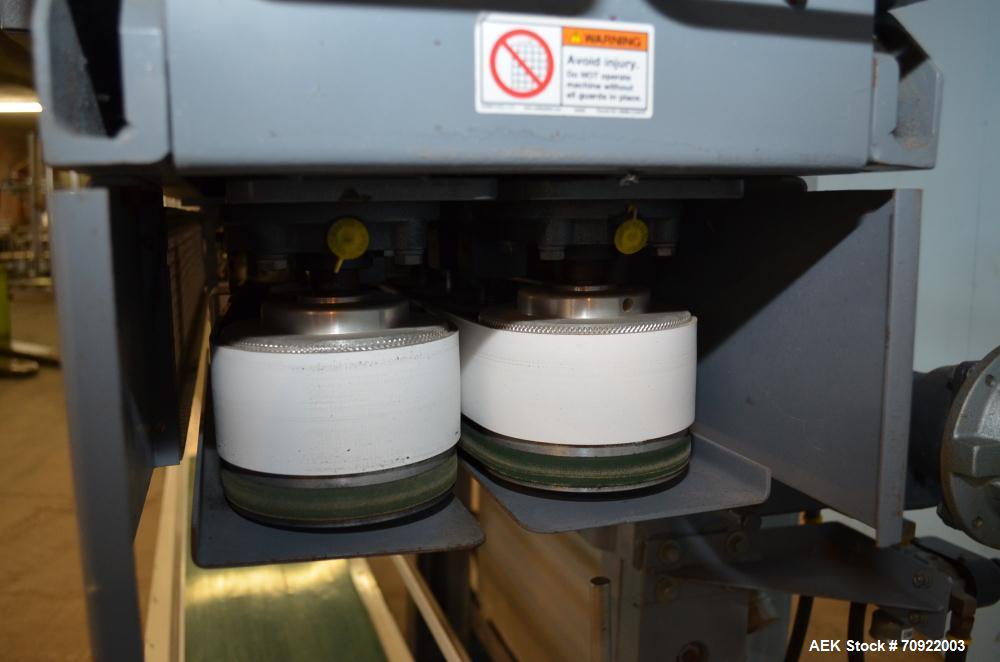 Used Altivity Packaging Model 901 Band Sealer / Closer. Designed for bags, approximate 48” long band length. With horizontal rubber belt take away conveyor in steel frame 12” x 174” long. .230 Volt, ...