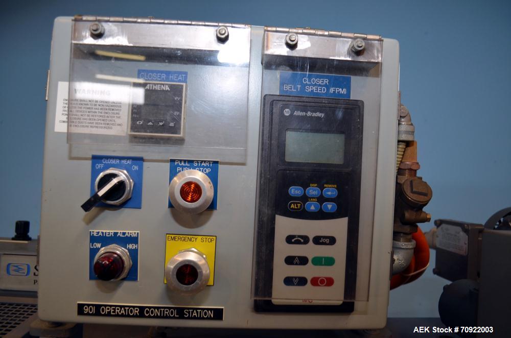 Used Altivity Packaging Model 901 Band Sealer / Closer. Designed for bags, approximate 48” long band length. With horizontal rubber belt take away conveyor in steel frame 12” x 174” long. .230 Volt, ...