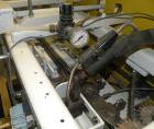 Used Doboy Hot Melt Glue Pinch Bottom Bag Sealer, Model CHG-HD. Capable of speeds up to 100 bags per minute. Machine operates right to left. Runs a double fold design with a bag size range: 3 to 20 l...