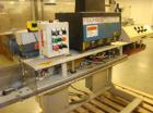 USED: Fischbein DRC200 single or double fold hot melt bag sealercapable of running at speeds up to 60' per minute. Has Nordson hotmelt glue system. Pinch bottom bag sealer has a bag size range of5