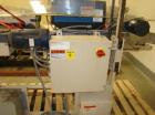 USED: Fischbein DRC200 single or double fold hot melt bag sealercapable of running at speeds up to 60' per minute. Has Nordson hotmelt glue system. Pinch bottom bag sealer has a bag size range of5
