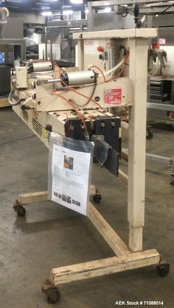Used Fischbein Model PBC 5600  Hot Air Pinch Bottom Bag Sealer for bags with pre-applied glue. Capble of speeds up to 85 feet per minute.    Has an empty bag size range: (Width) 12" - 20" or 304mm - ...