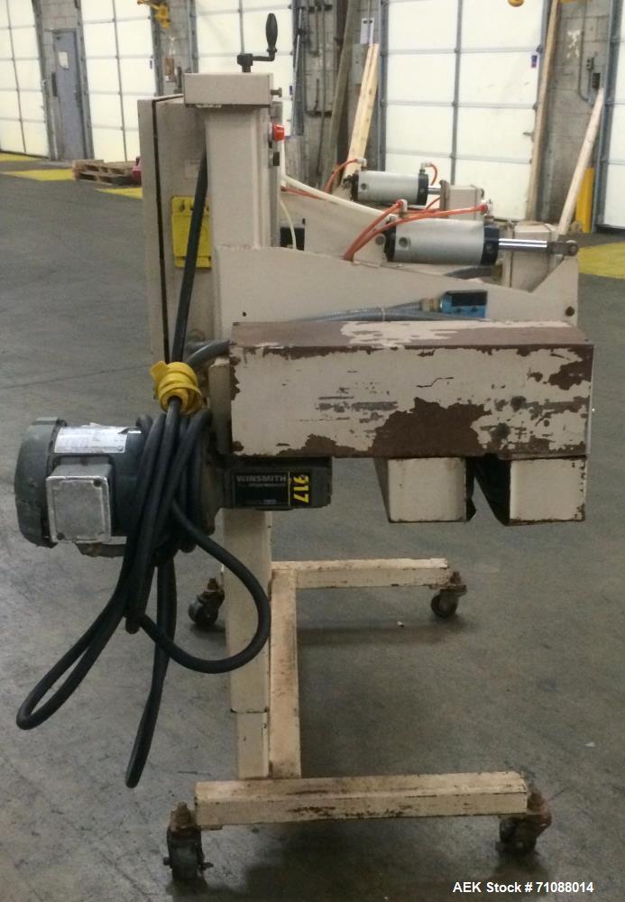Used Fischbein Model PBC 5600  Hot Air Pinch Bottom Bag Sealer for bags with pre-applied glue. Capble of speeds up to 85 feet per minute.    Has an empty bag size range: (Width) 12" - 20" or 304mm - ...
