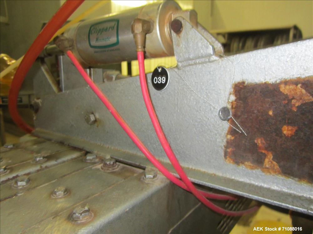 Used Fischbein Model PBC 5600  Hot Air Pinch Bottom Bag Sealer fo rbags with pre-applied glue. Capble of speeds up to 85 feet per minute.  Handles glue flaps up to 2-1/2".  Has an empty bag size rang...