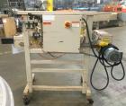 Used Fischbein Model PBC 5600  Hot Air Pinch Bottom Bag Sealer for bags with pre-applied glue. Capble of speeds up to 85 feet per minute.    Has an empty bag size range: (Width) 12