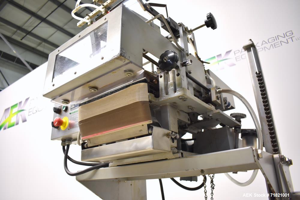 Used Bosch Doboy Semi-Automatic Bag Top Labeler, Model JSL.  Heat seals a paper header label to the top of a premade bag.  Speed up to 30 bags / minute.  Label Width: 2.5" - 9.5" (6.35 - 24.13 cm); U...