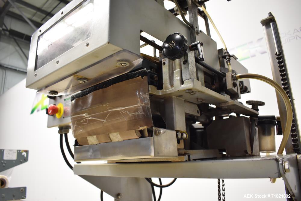 Used Bosch Doboy Semi-Automatic Bag Top Labeler, Model JSL.  Heat seals a paper header label to the top of a premade bag.  Speed Up to 30 bags / min.  Label width; 2.5" - 9.5" (6.35 - 24.13 cm), Unfo...