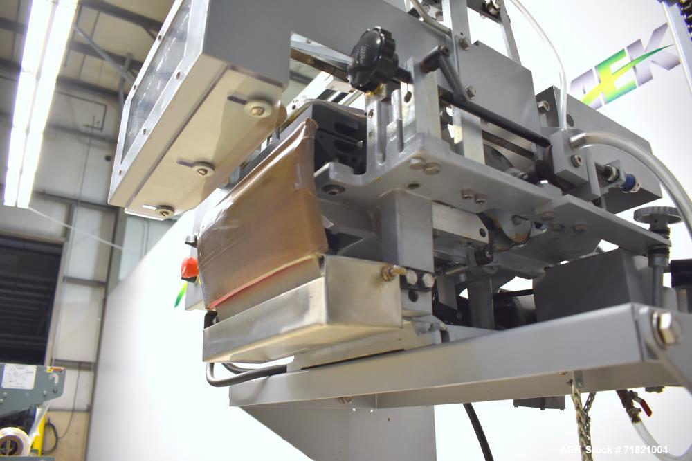 Used Bosch Doboy Semi-Automatic Bag Top Labeler, Model JSL.  Heat seals a paper header label to the top of a premade bag.  Speed Up to 30 bags / min.  Label width; 2.5" - 9.5" (6.35 - 24.13 cm), Unfo...