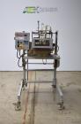 Used Bosch Doboy Semi-Automatic Bag Top Labeler, Model JSL.  Heat seals a paper header label to the top of a premade bag.  Speed Up to 30 bags / min.  Label width; 2.5