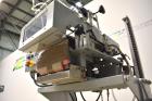Used Bosch Doboy Semi-Automatic Bag Top Labeler, Model JSL.  Heat seals a paper header label to the top of a premade bag.  Speed Up to 30 bags / min.  Label width; 2.5