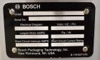 Used Bosch Doboy Semi-Automatic Bag Top Labeler, Model JSL.  Heat seals a paper header label to the top of a premade bag.  Speed Up to 30 bags / min.  Label width; 2.5
