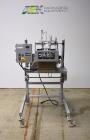 Used Bosch Doboy Semi-Automatic Bag Top Labeler, Model JSL.  Heat seals a paper header label to the top of a premade bag.  Speed Up to 30 bags / min.  Label width; 2.5
