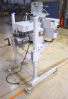 Used Bosch Doboy Semi-Automatic Bag Top Labeler, Model JSL.  Heat seals a paper header label to the top of a premade bag.  Speed Up to 30 bags / min.  Label width; 2.5